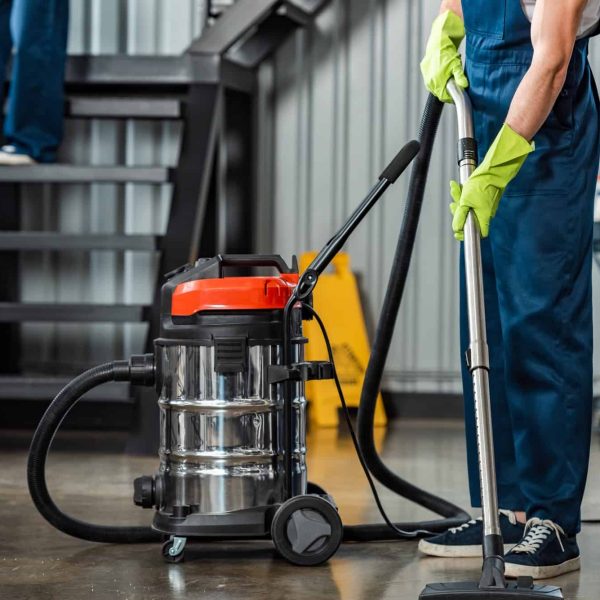 cropped-view-of-cleaner-in-uniform-cleaning-floor-with-vacuum-cleaner.jpg